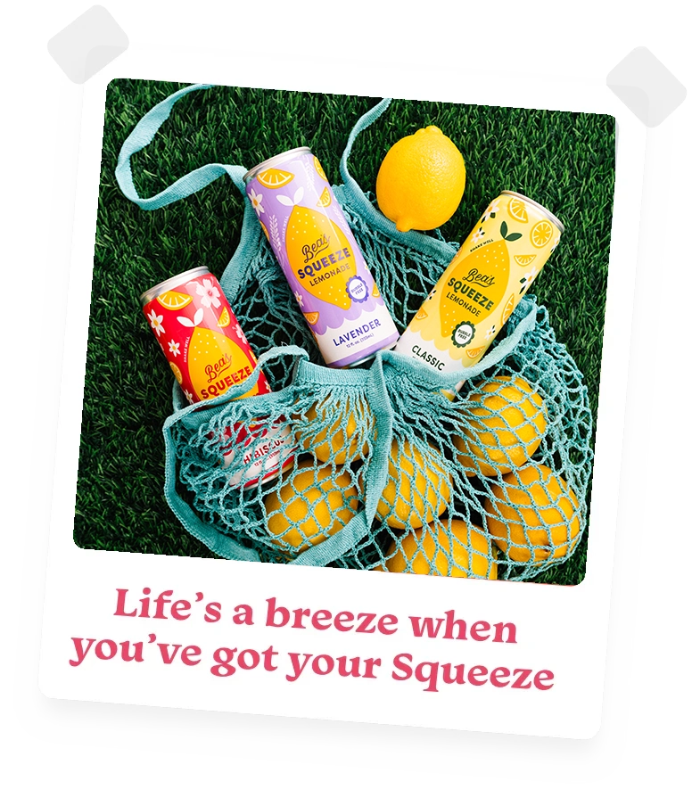 photo of three happy young women outdoors holding bottles of Bea's Squeeze lemonade with the caption Life's a breeze when you've got your Squeeze.